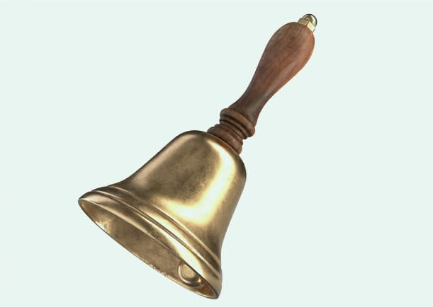 Gold hand bell on isolated background